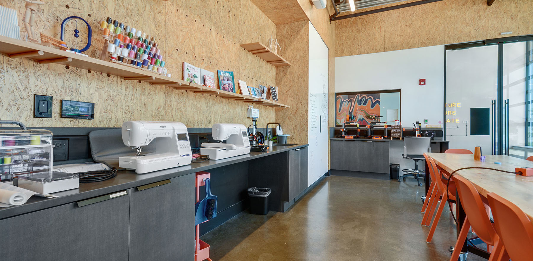 maker space image showing sewing machines at addison east boston apartments